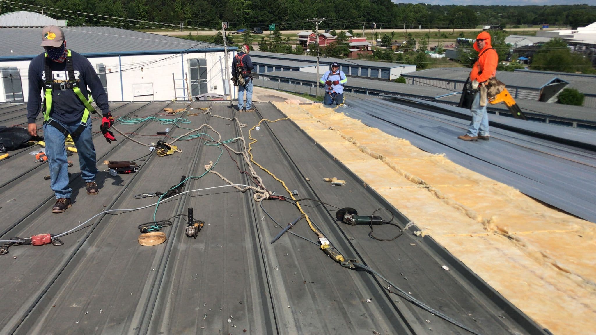 Alabaster Alabama commercial low-slope roof along the I-65 corridor with rooftop mechanical equipment near Shelby Baptist Medical Center