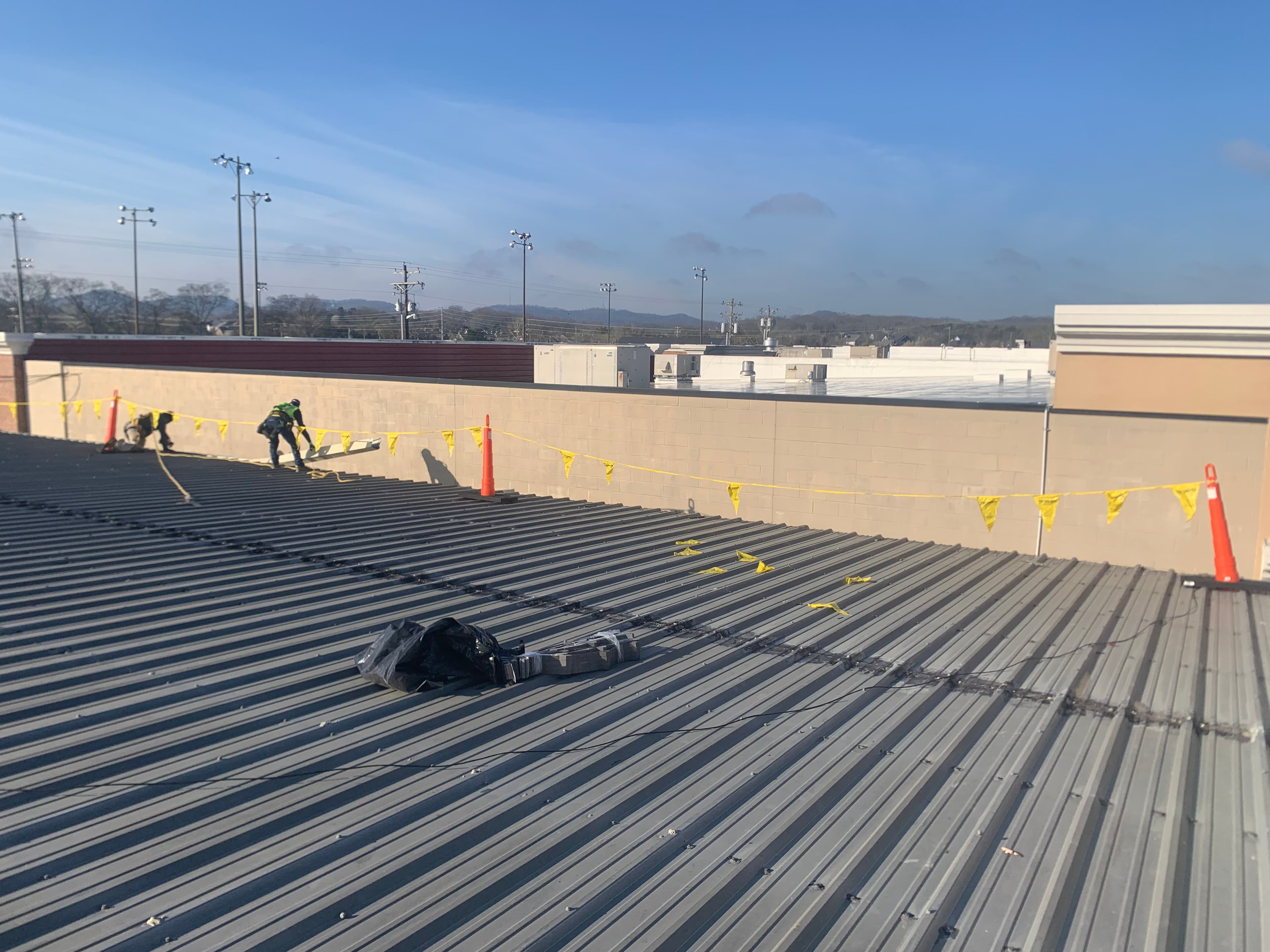 Commercial roofing Columbus GA - Fort Moore adjacency, Aflac corporate, Chattahoochee RiverWalk redevelopment, military-adjacent housing coverage