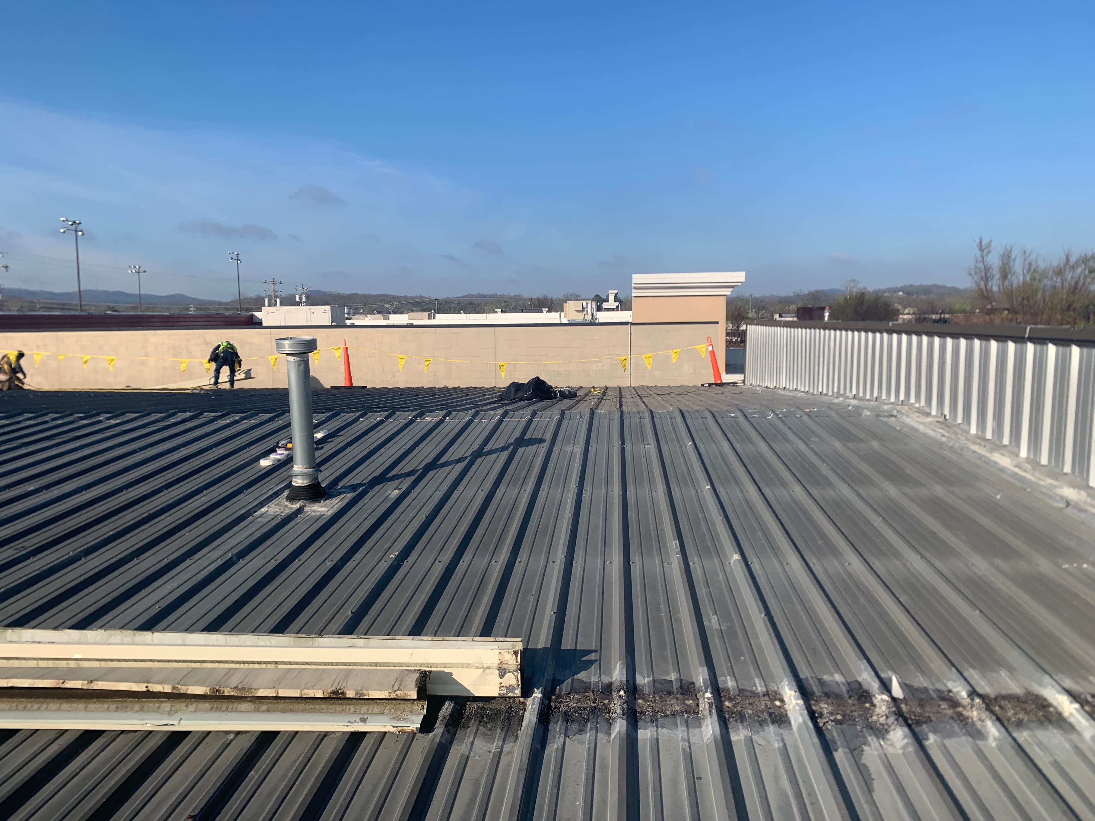 Cummings Research Park commercial roofing - spring-hail corridor documentation for aerospace, defense, and tech tenant properties