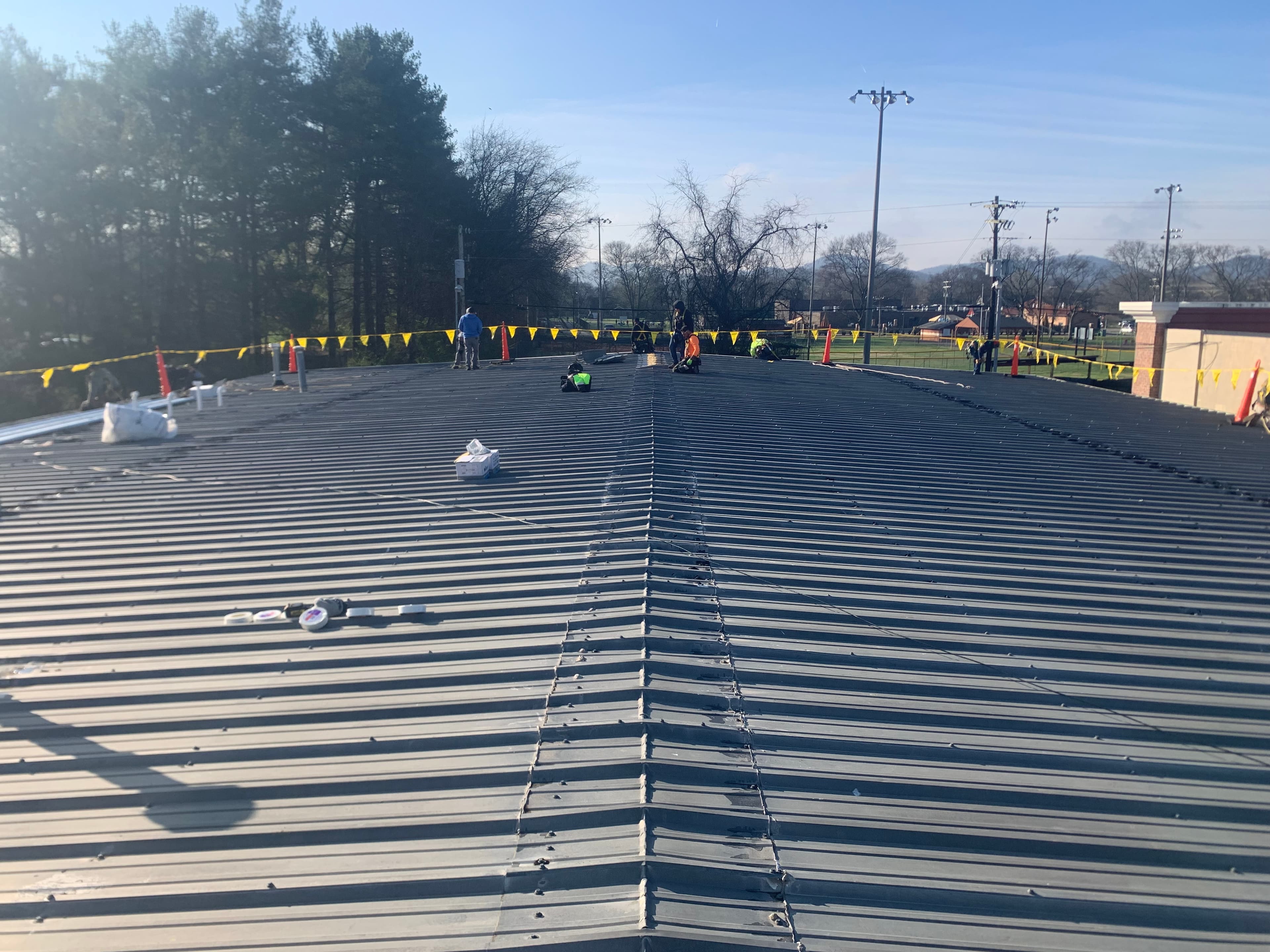 Commercial roofing Mobile AL - Gulf Coast hospitality, port-adjacent industrial, Airbus manufacturing adjacency, and named-storm-rated commercial specifications