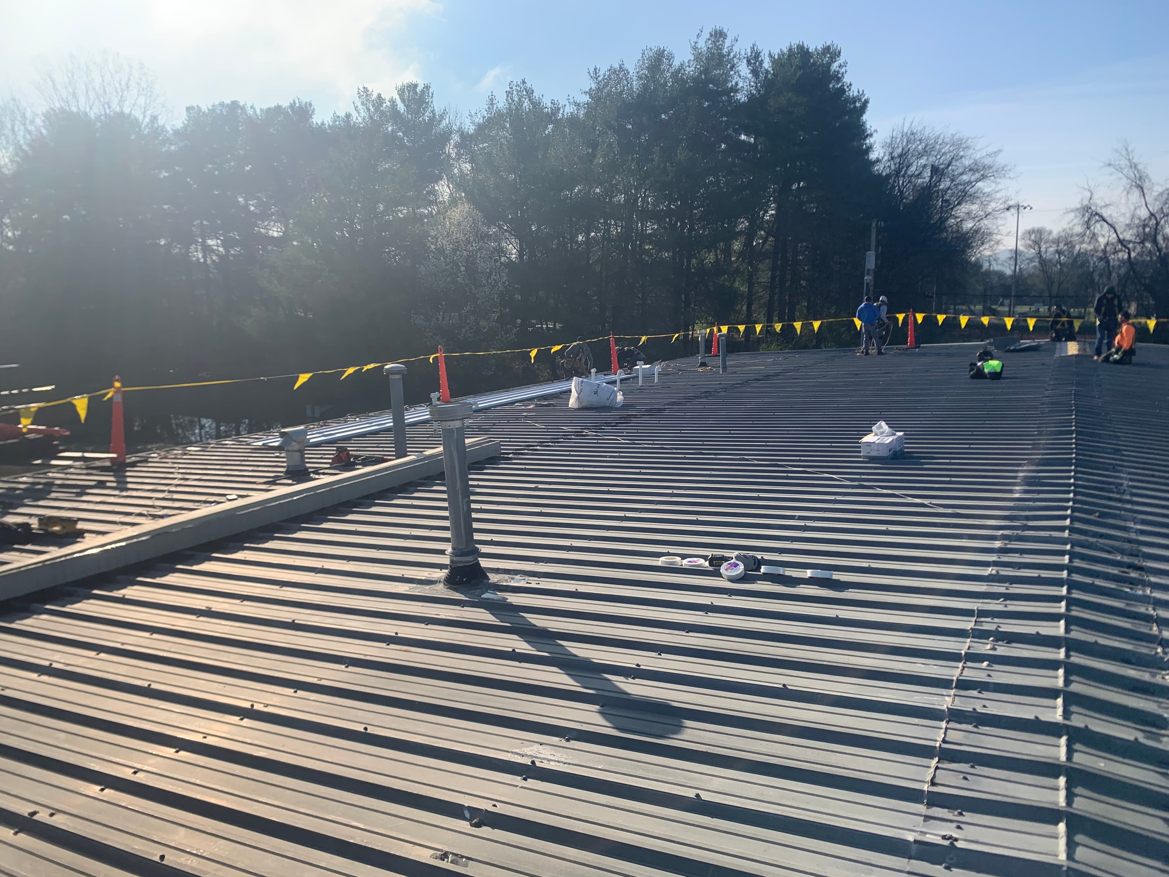 Mobile port-adjacent industrial commercial roofing - wind-uplift-rated systems for Gulf hurricane exposure