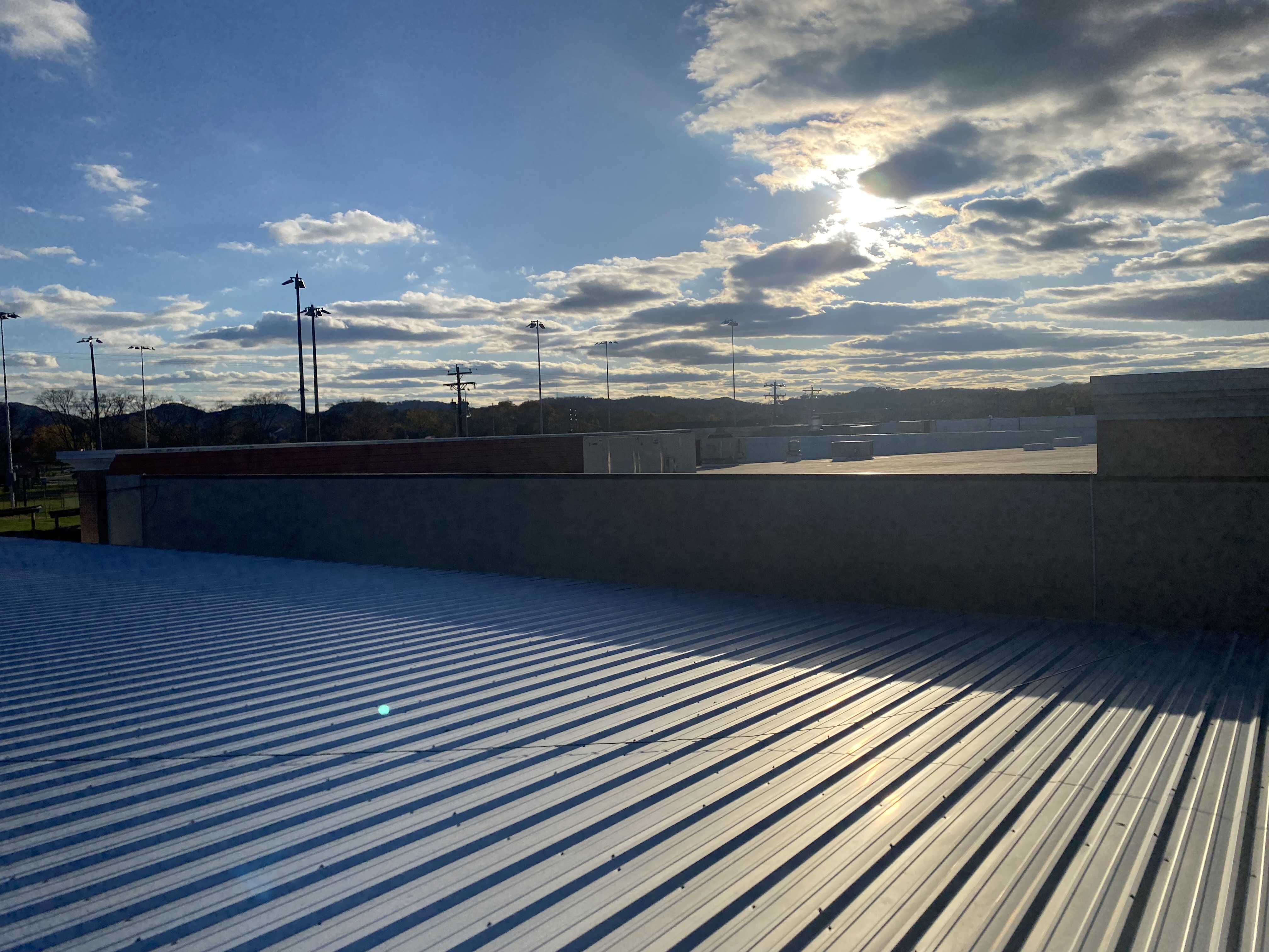 Post-storm commercial roof inspection - drone-assisted aerial documentation and photo-keyed damage mapping for insurance carrier review